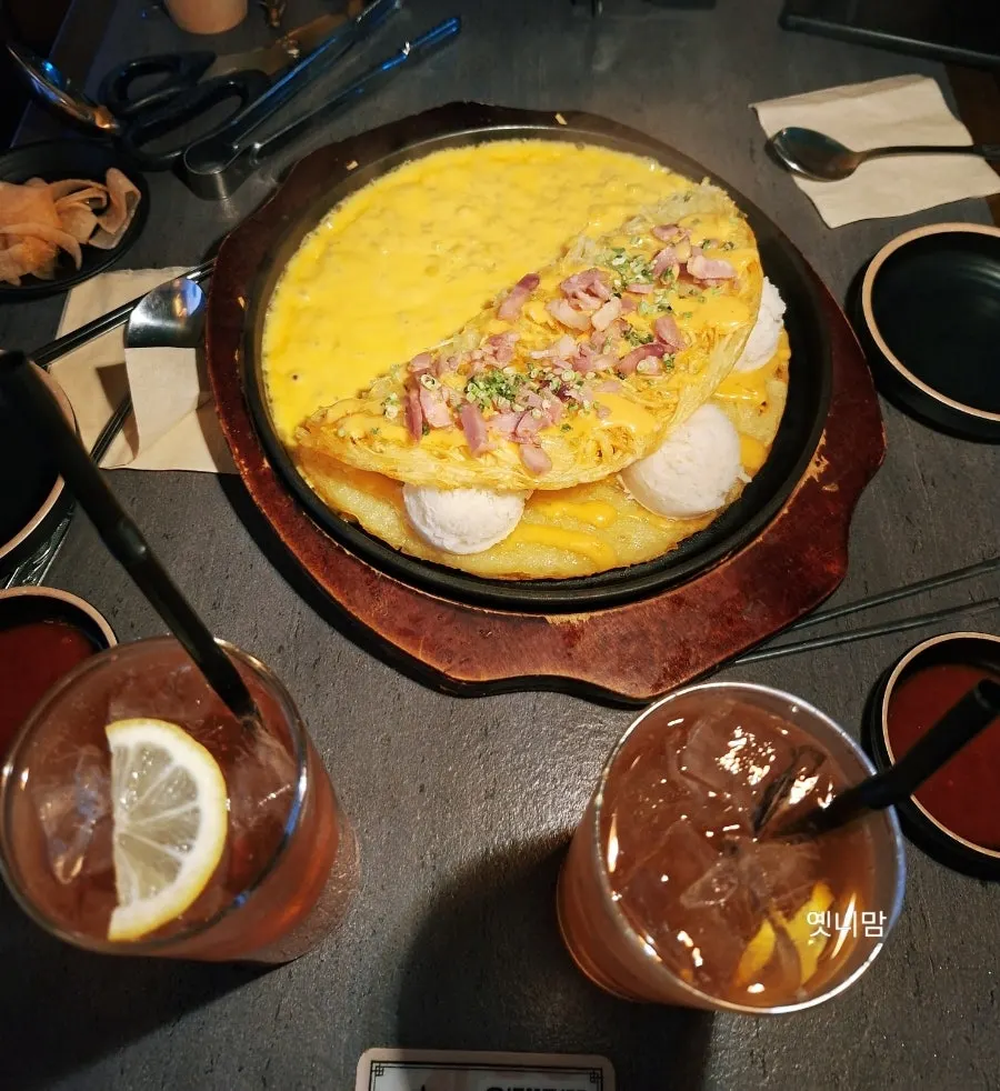 Bubbly cheese potato pancake piled high with cheese