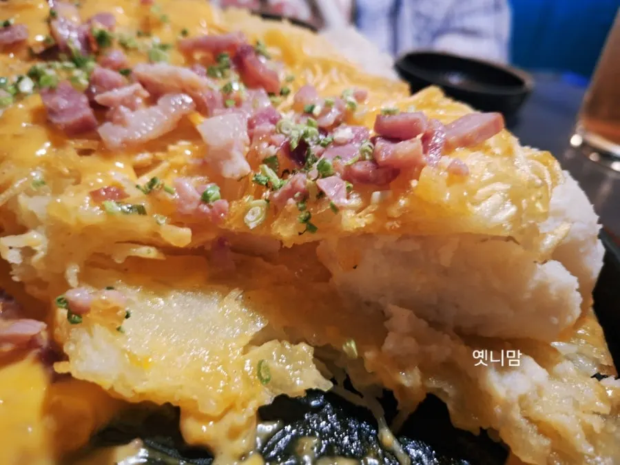 A crispy piece of the potato pancake