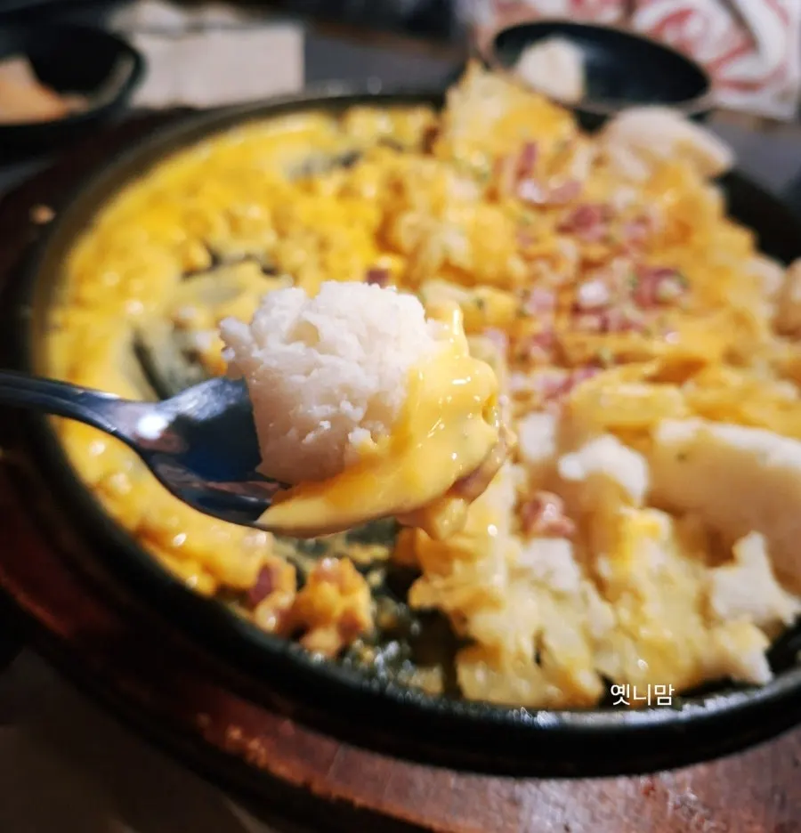 Potato pancake and chicken hot pot on the table together