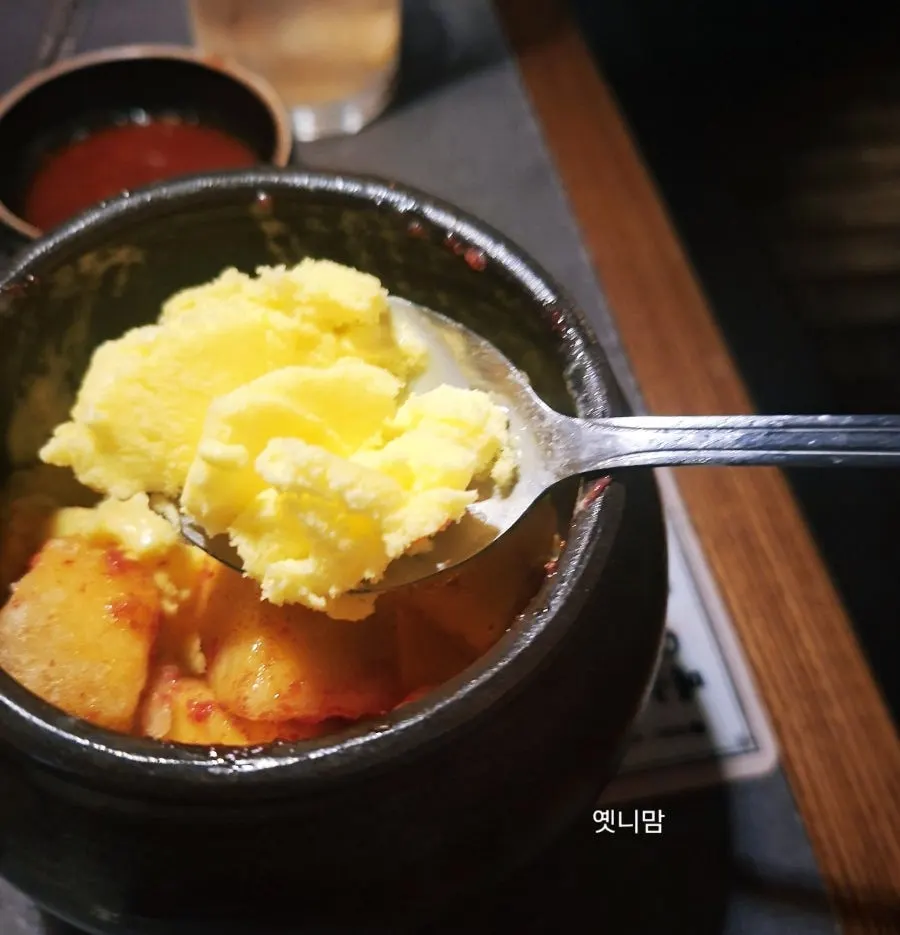 A spoonful of the mango shaved ice