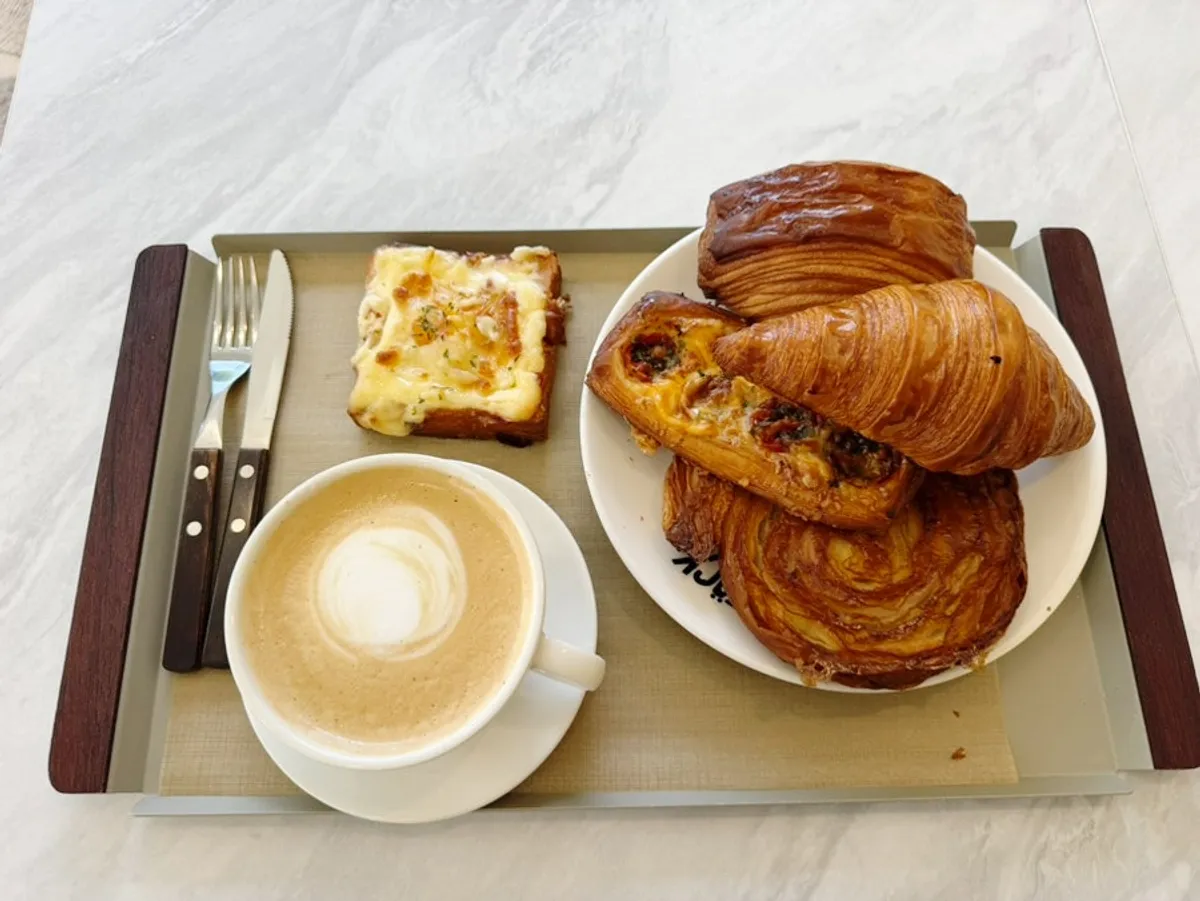 Crisp pastries and coffee spread