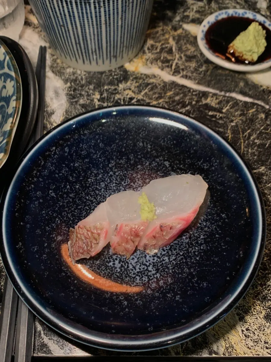 Aged mixed sashimi with red seabream, salmon, and abalone