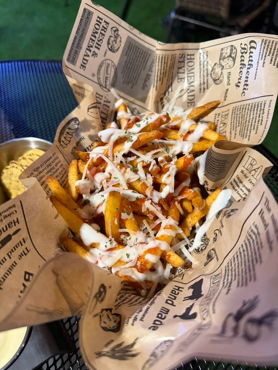 A plate of chili cheese fries