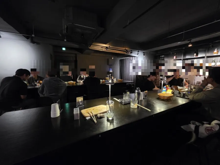 Wide shot of a table at Uu, a solo-drinking bar in Konkuk
