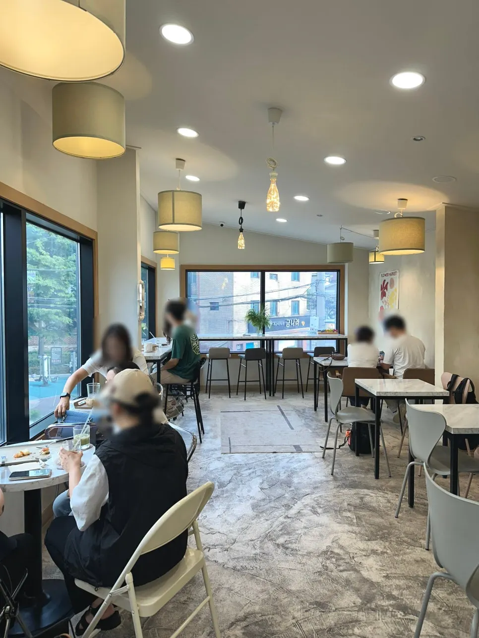 Second-floor tables and window seats at Stack Bakery