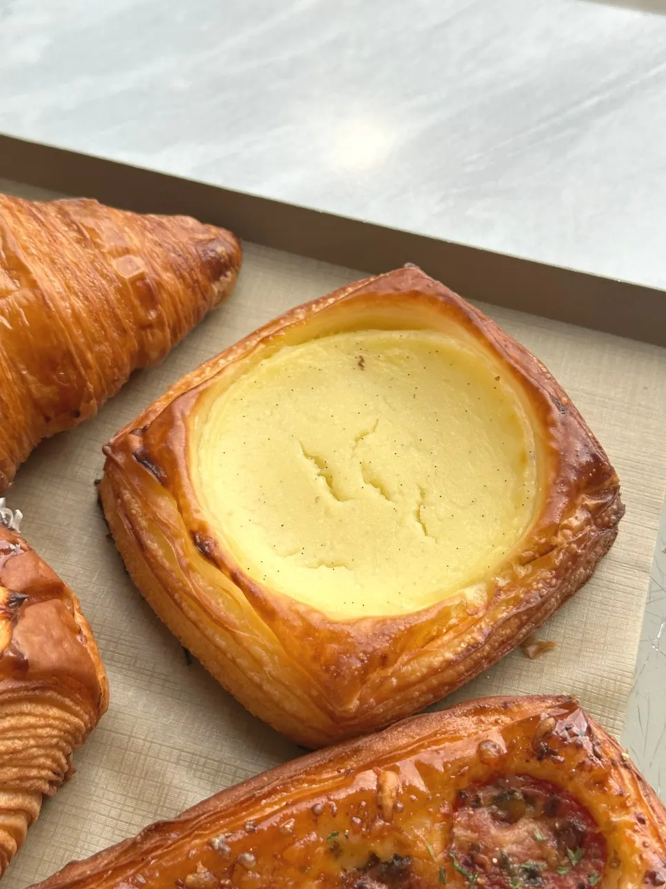 Plate with ham & cheese pain au and croissant
