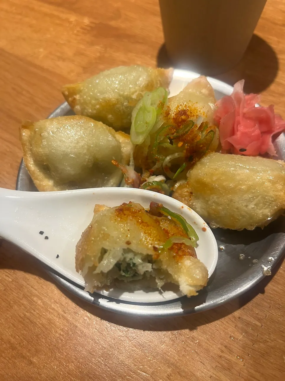 Fried gyoza with shichimi and scallions