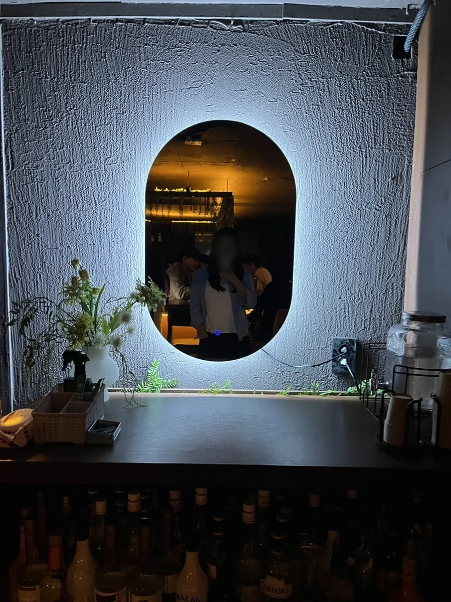 Area for checking makeup and drinking water