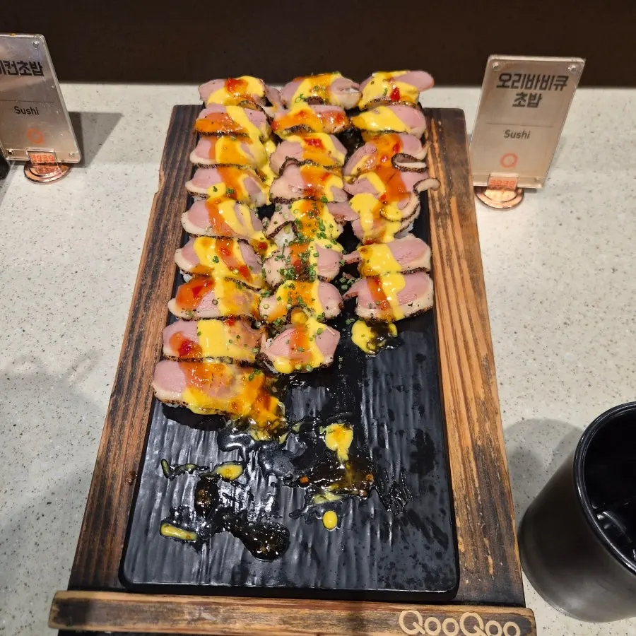 A plate of raw salmon sashimi