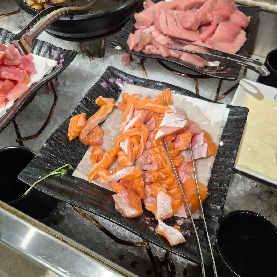 A plate of smoked duck and lamb chops