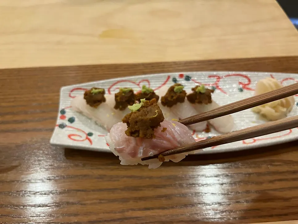 A plate of monkfish liver flounder sushi, 6 pieces