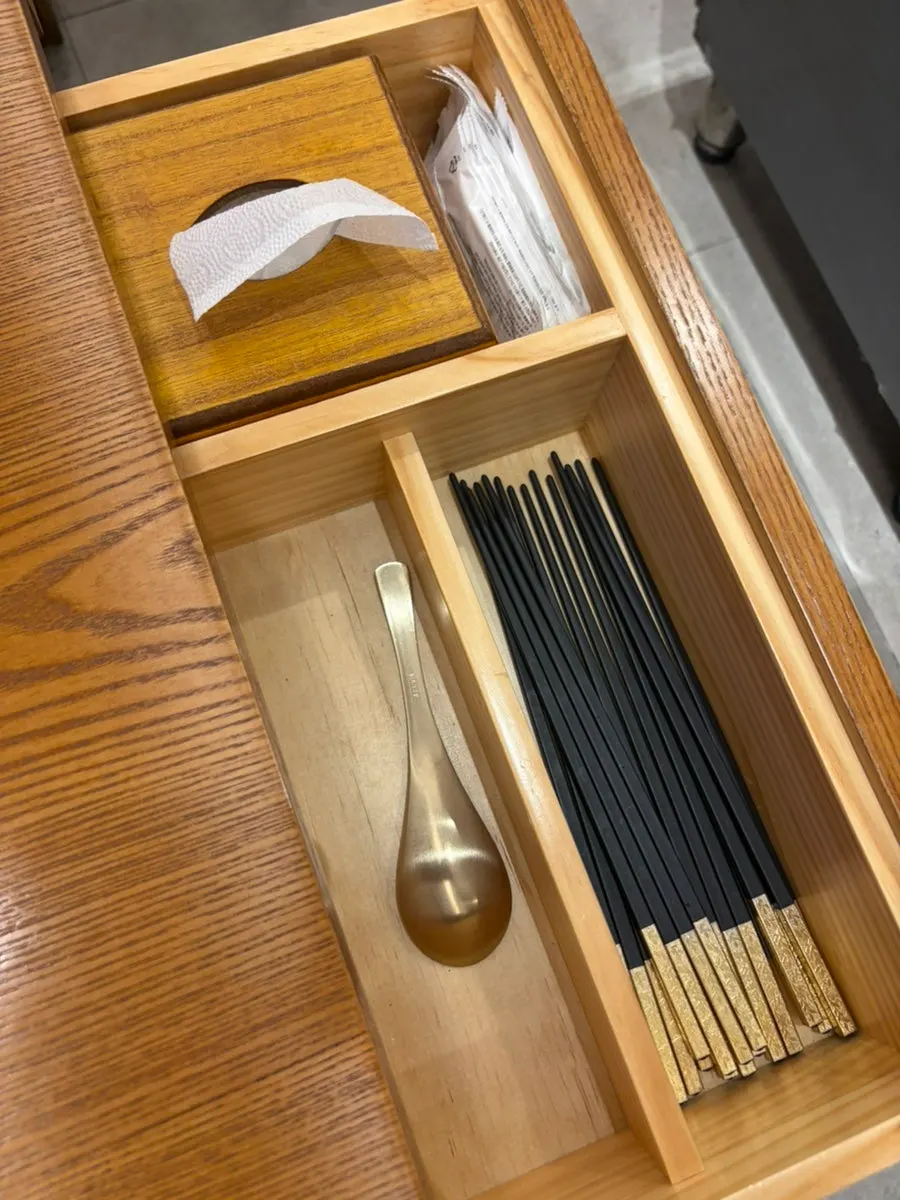 Table set with tonkatsu sauce and sesame seeds