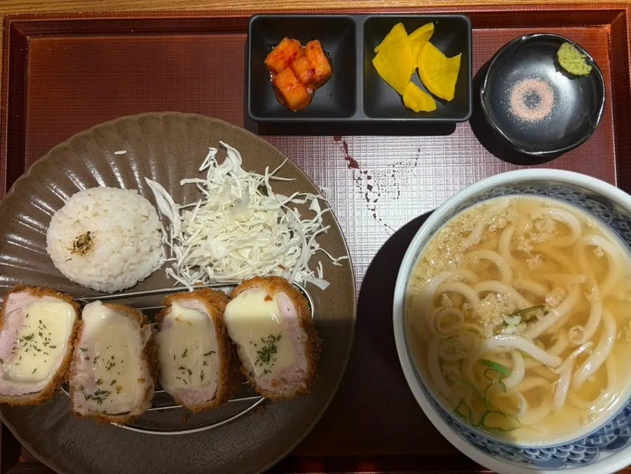 Four crisply fried pieces of cheese tonkatsu