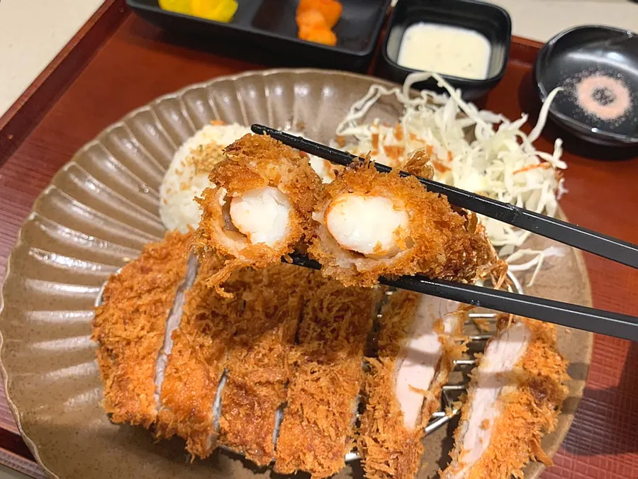 Plump king shrimp katsu meat visible in the crust
