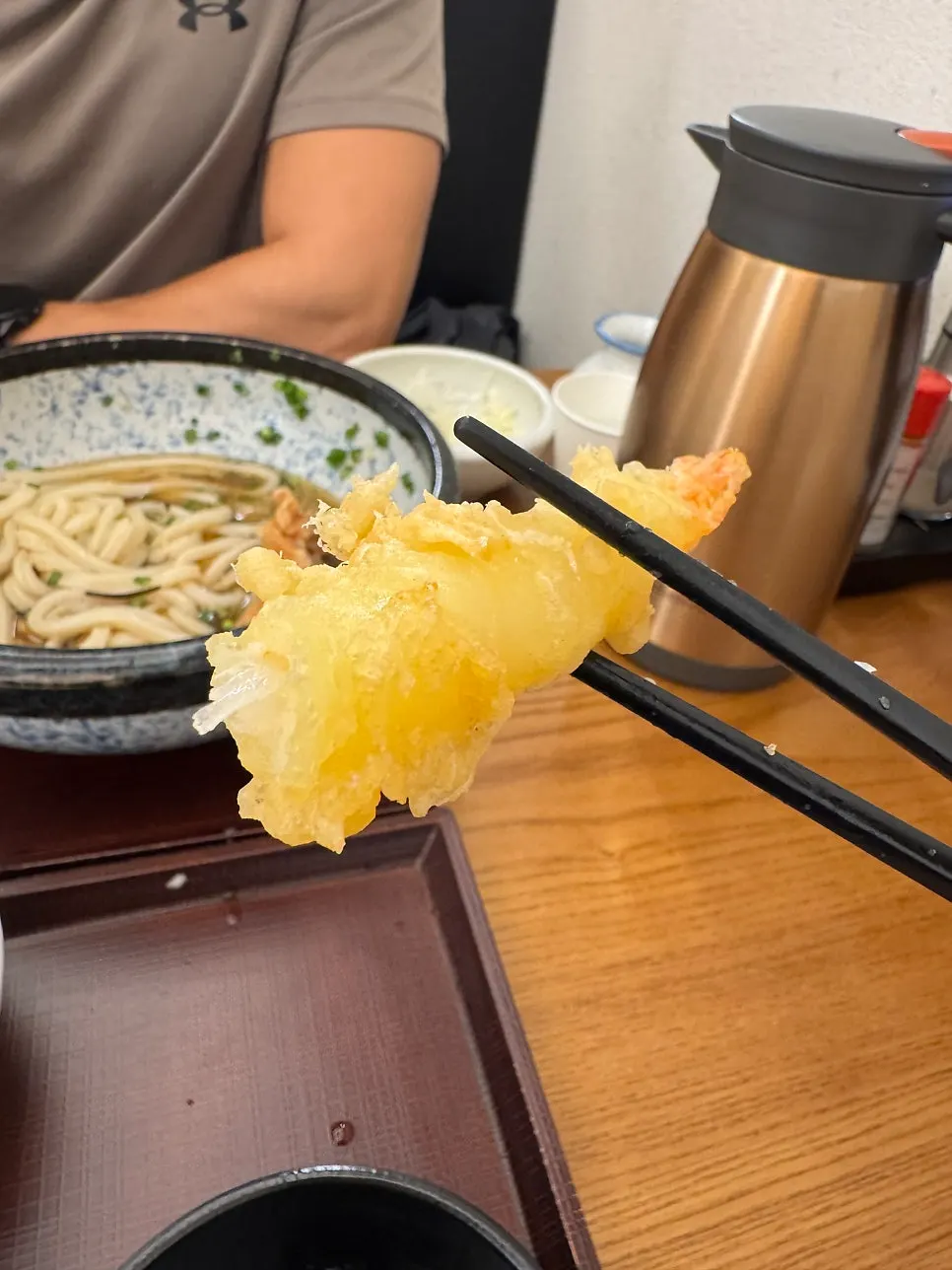 A spoonful of gyudon lifted up