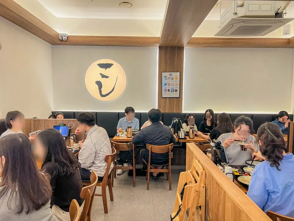 Interior of Kosi Isu Branch busy with lunch guests
