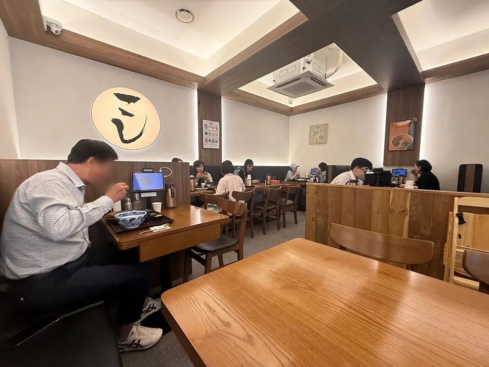 Interior of Kosi Isu Branch with plenty of tables