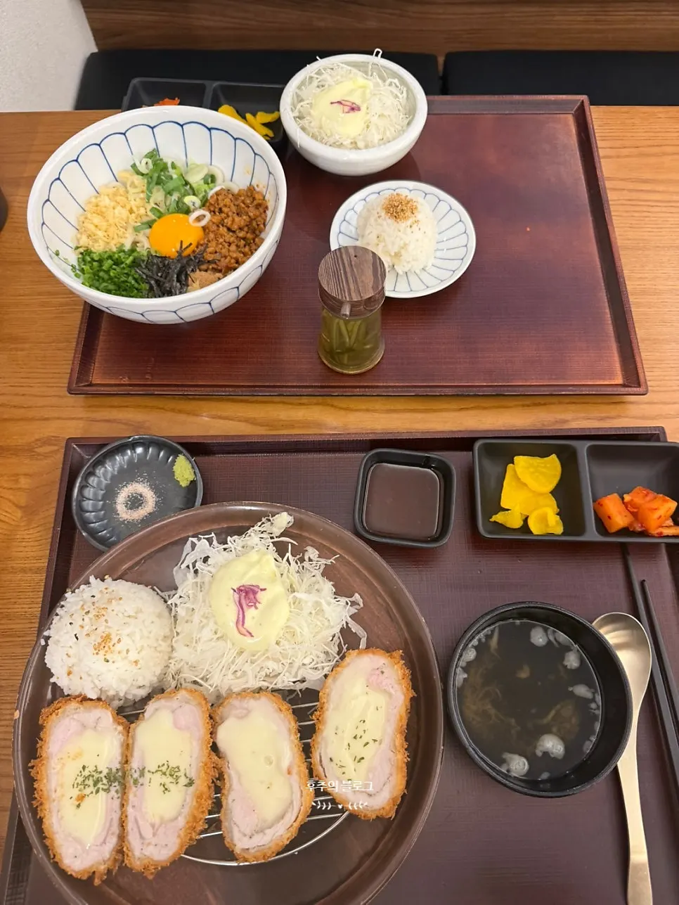 Table setting with cheese katsu and mazesoba udon