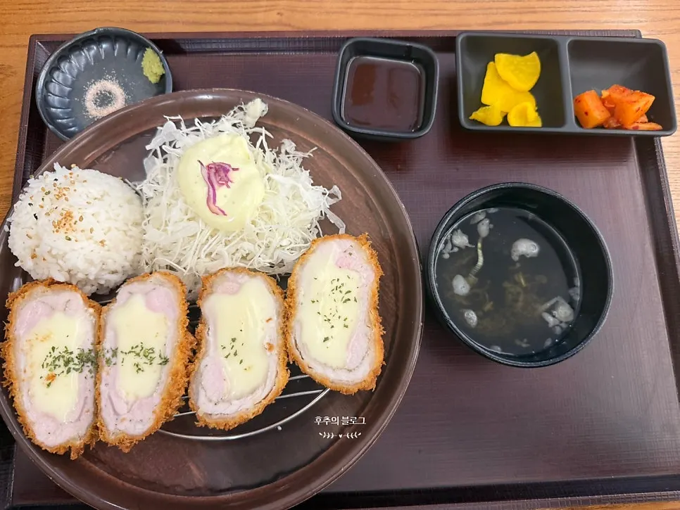 Plate of crispy fried cheese katsu