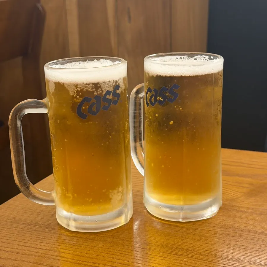 Cold draft beer ordered while waiting for wife