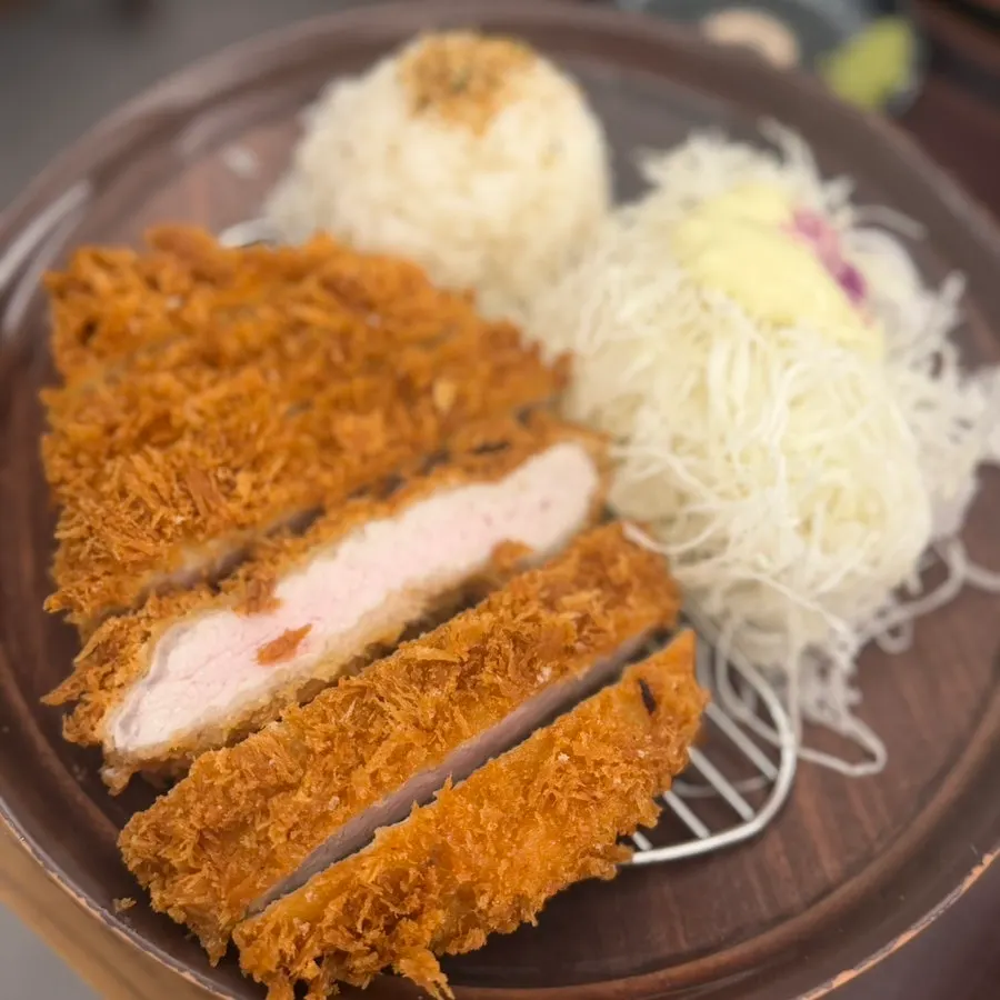 Tonkatsu and udon split in half on side plates
