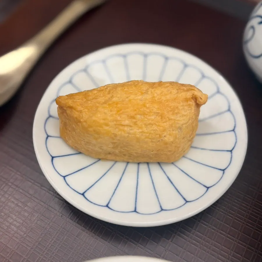Full spread of tonkatsu, mini udon and inari sushi