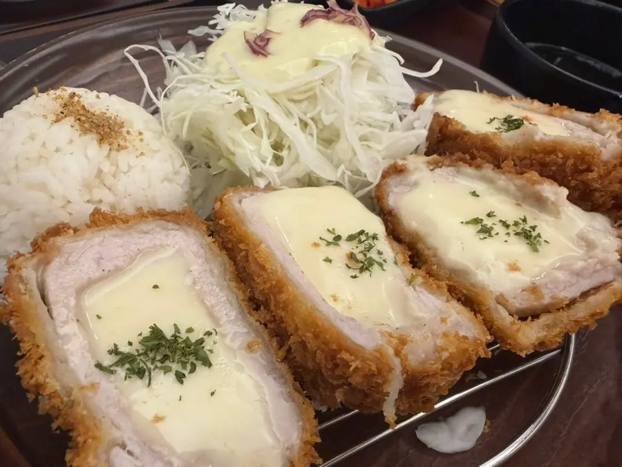 Cross-section of tonkatsu packed with cheese