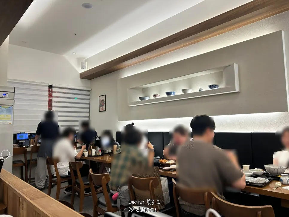 Ivory and wood-tone atmosphere at Kosi Isu Branch