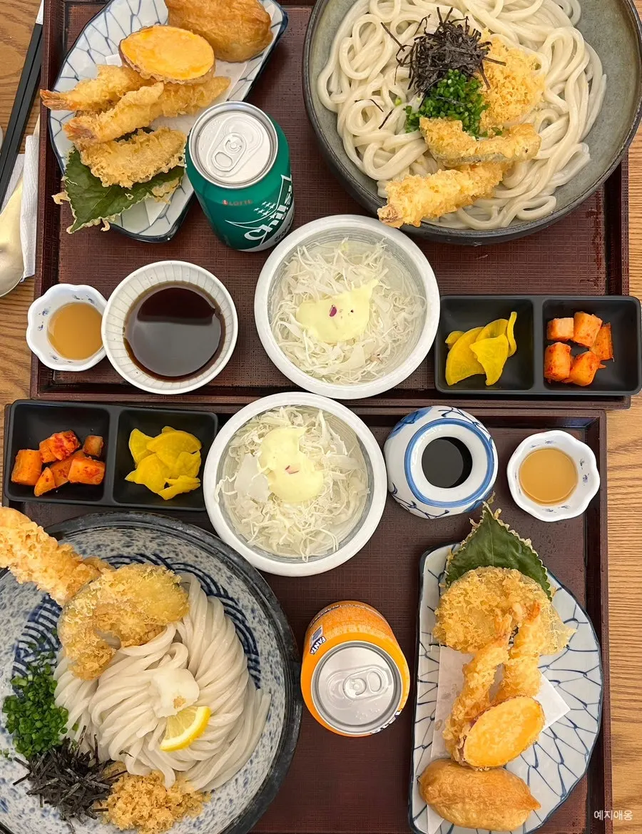 Table set with two generous udon set meals