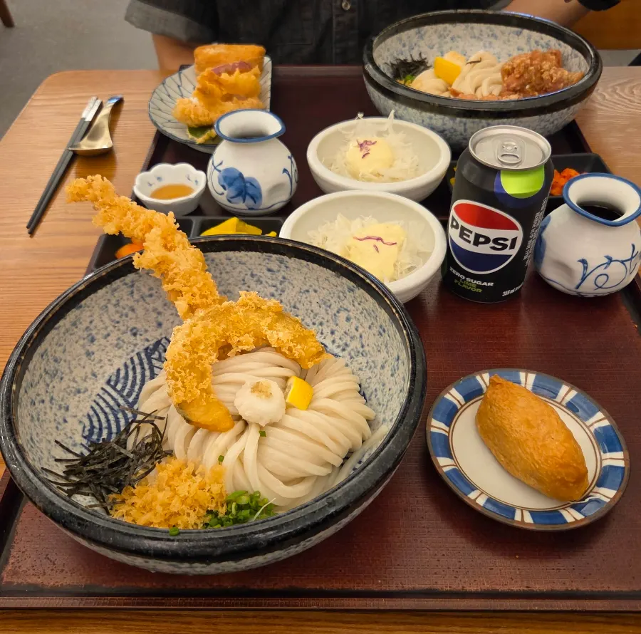Tenbukkake udon topped with fried pumpkin and shrimp