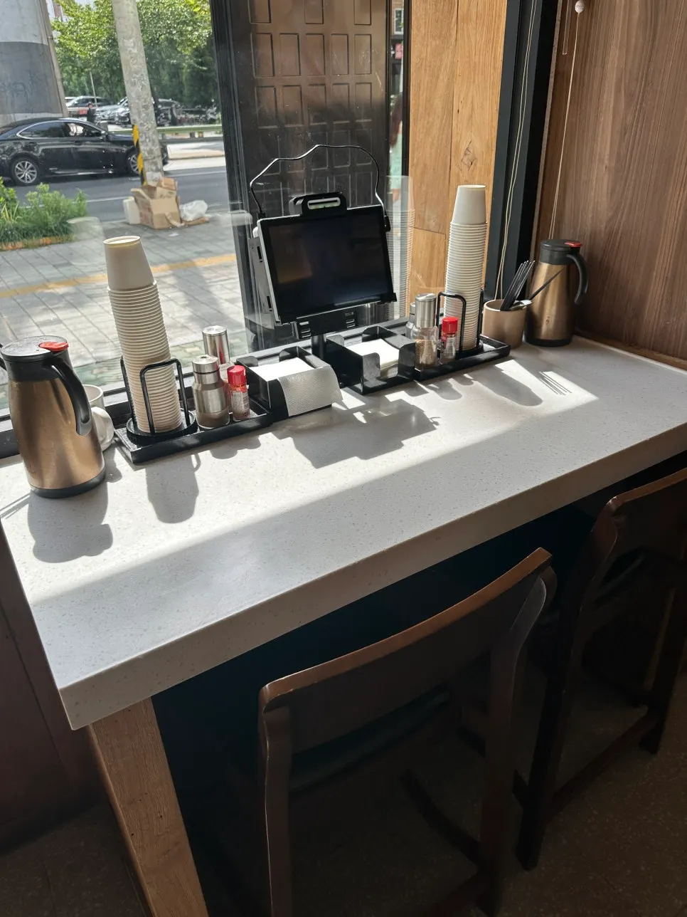Tables of various sizes throughout the restaurant