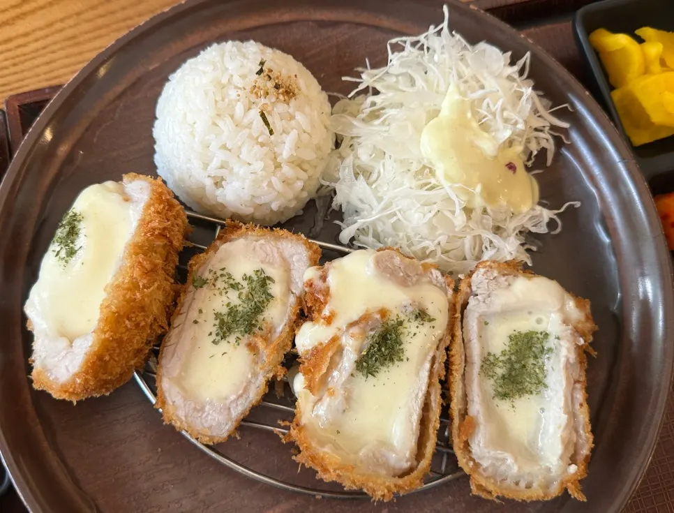 Sliced cheese katsu set on the table