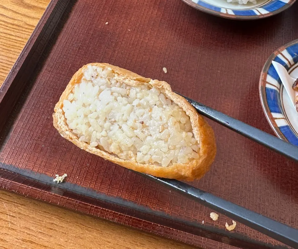 Inari sushi served alongside the mazesoba udon