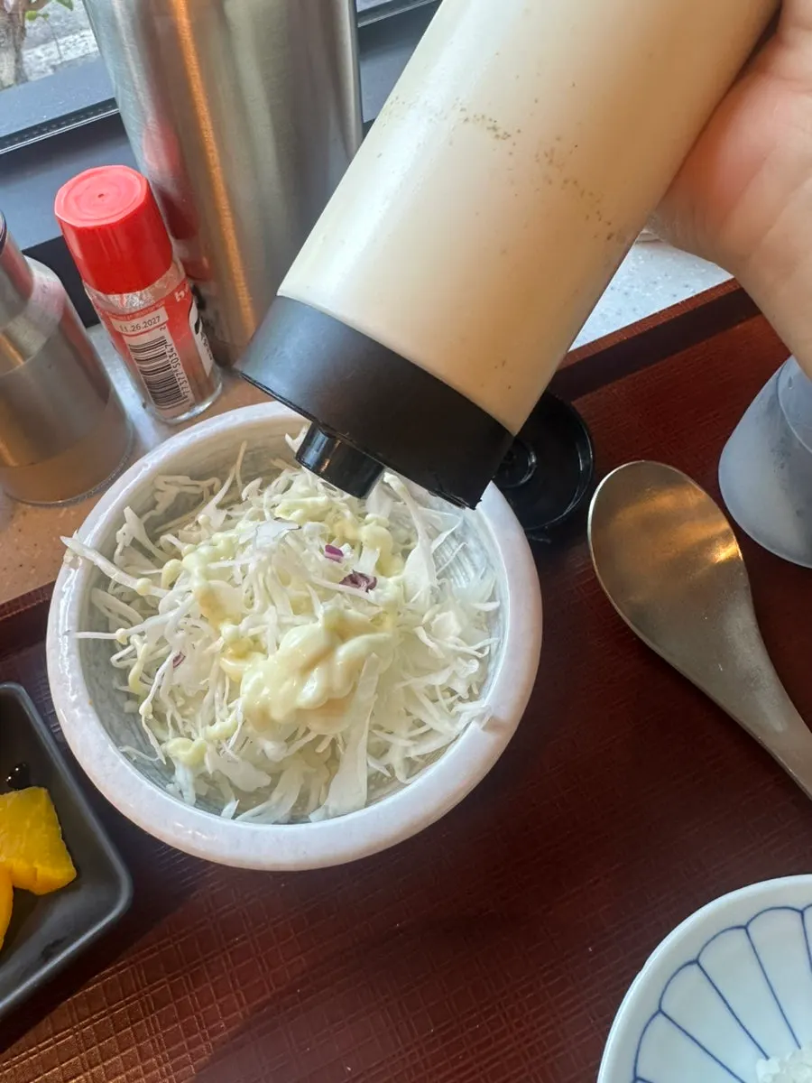 Salad sauce set out at the table