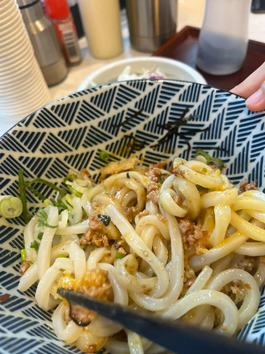 Noodles lifted from the mazesoba udon