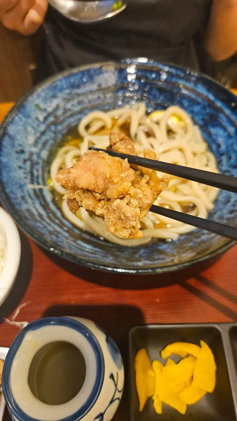 Chicken karaage, inari sushi, and cabbage salad