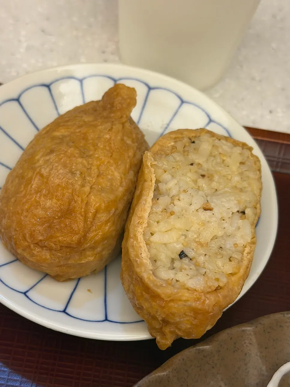 Close-up of the generously filled inari sushi