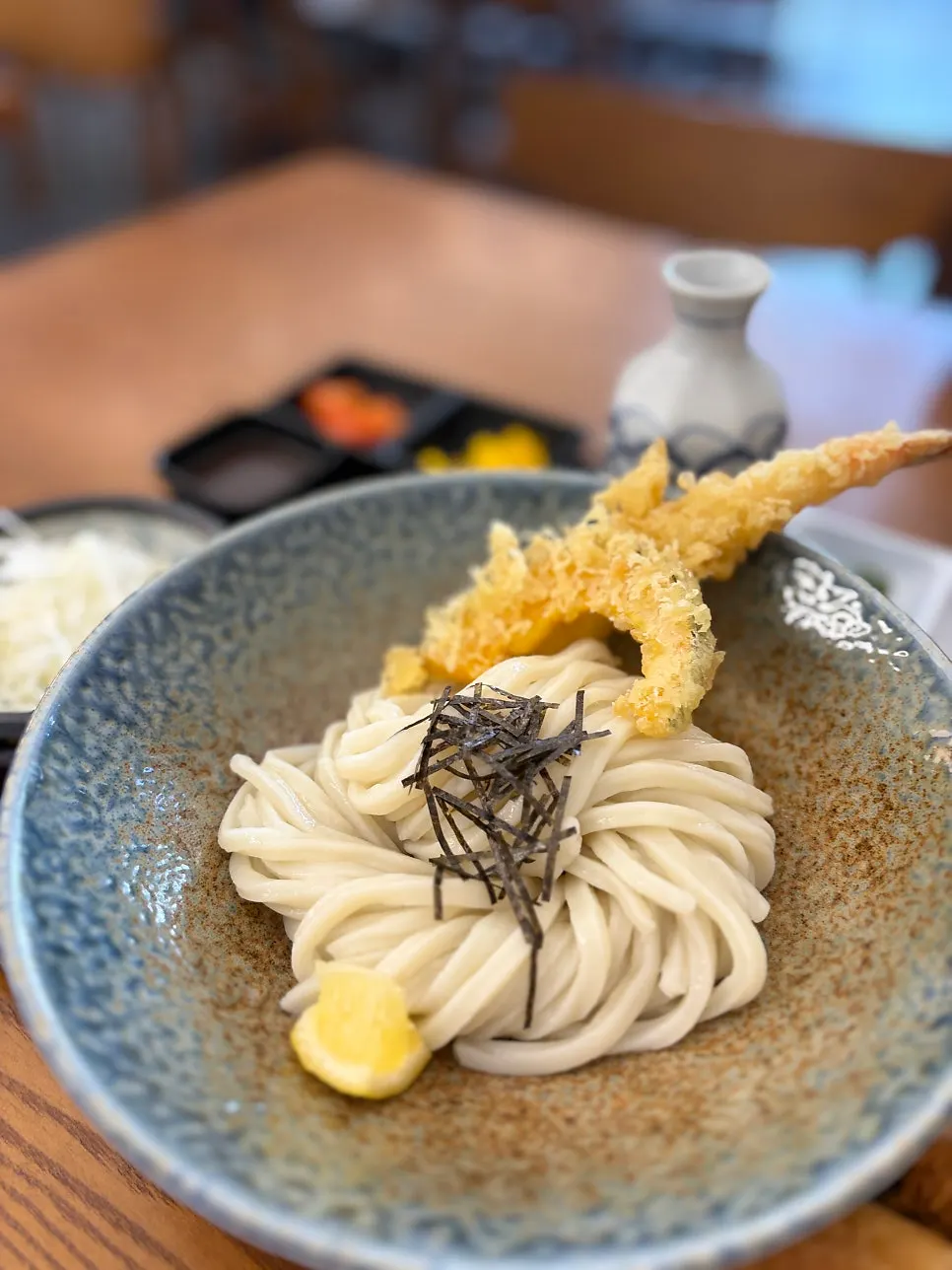Sauces and utensils set on the table at Kosi