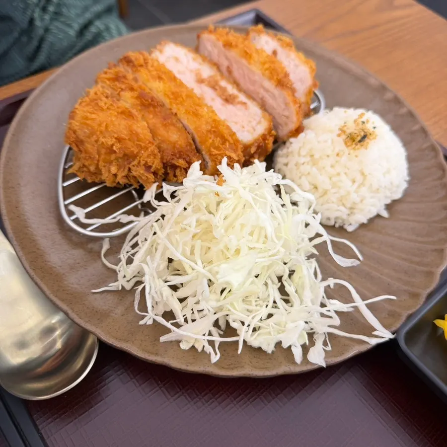 Cross-section of Kosi's thickly fried pork loin katsu