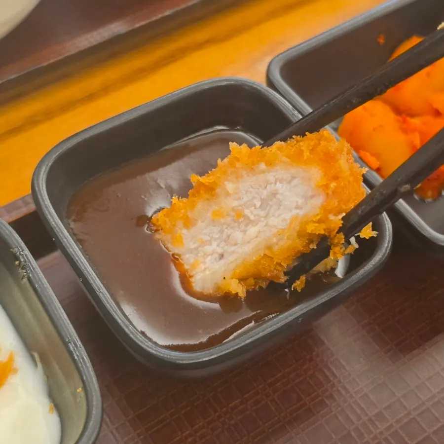 Tonkatsu served with pink salt and wasabi