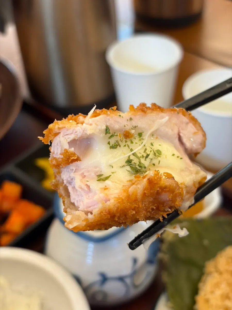Picking up a piece of fried chicken