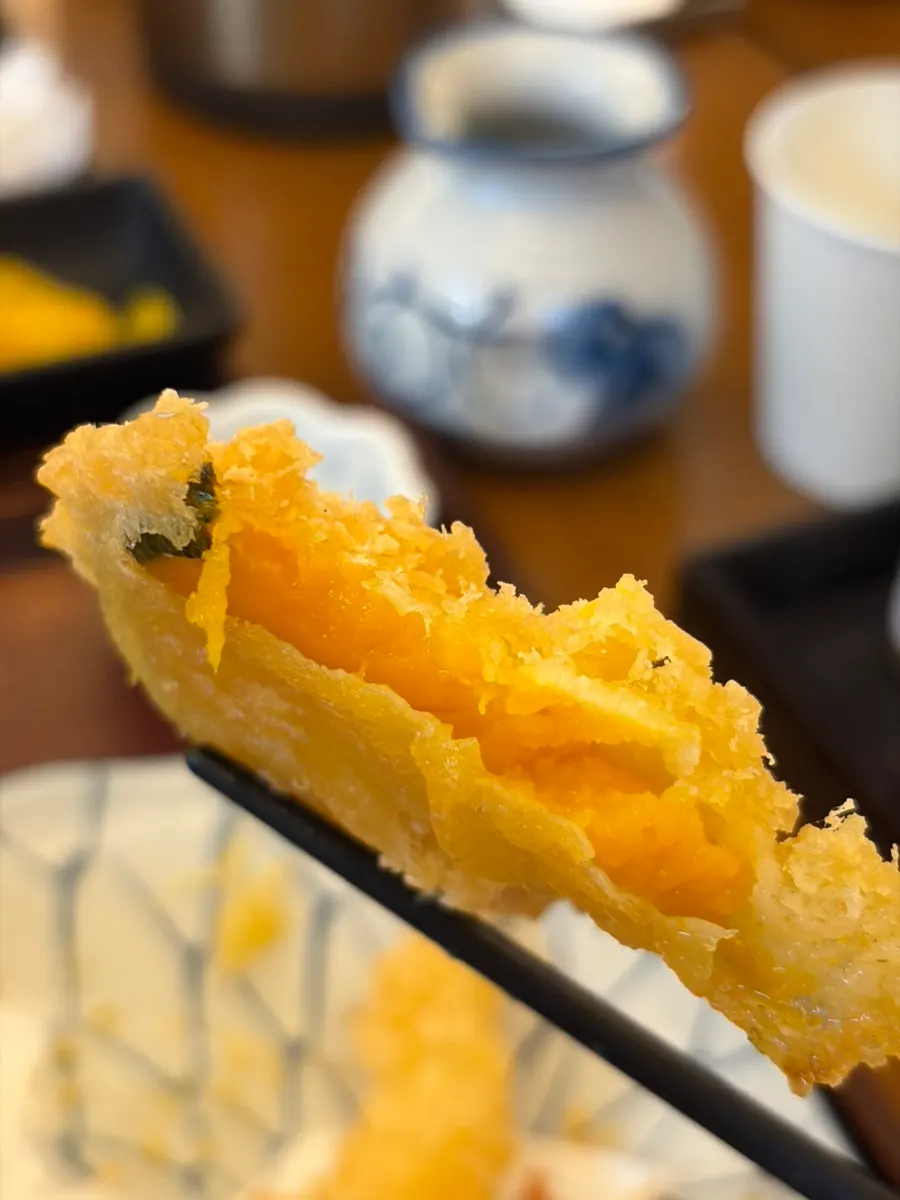 Plate of fried sides including fried perilla leaves