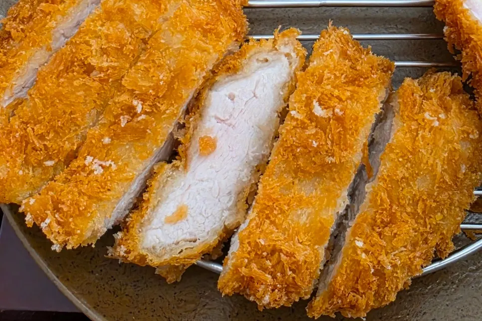Cross-section of the thick fresh pork loin cutlet