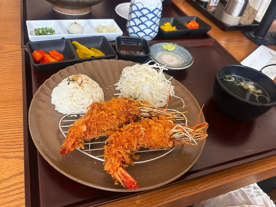 King shrimp katsu cut open to show the inside