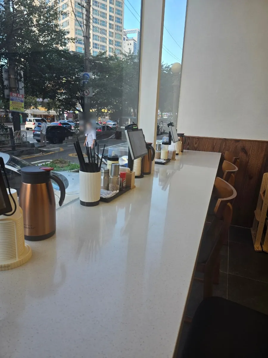 Window bar table seat with items provided at the table