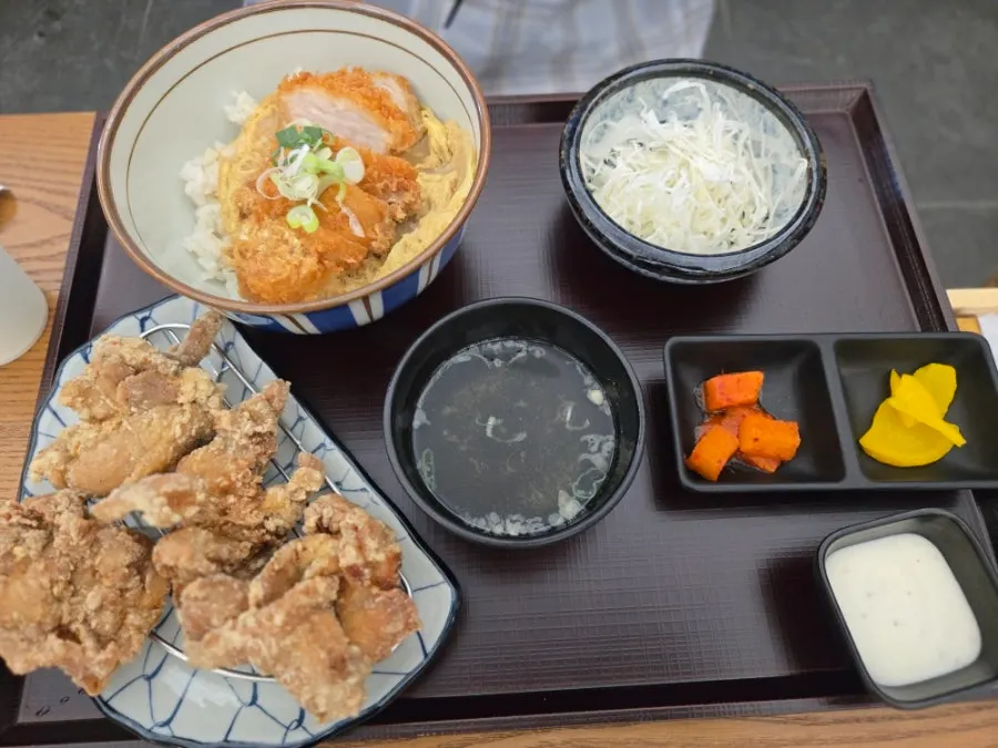 Table set with katsudon and fried chicken
