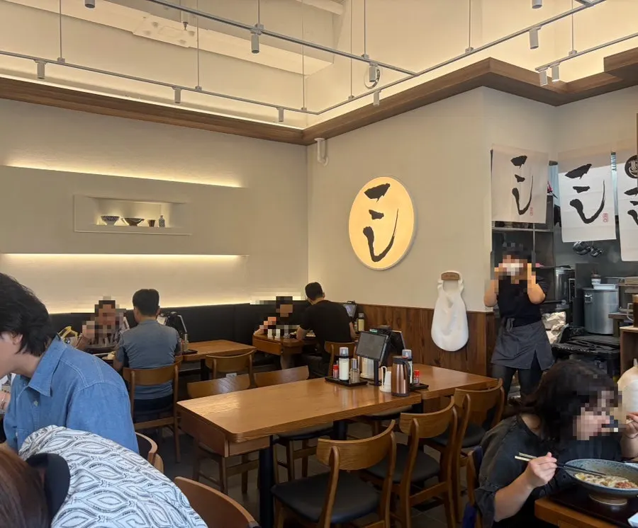 Interior of Kosi Seoul National University Entrance Branch, busy with weekend lunch customers