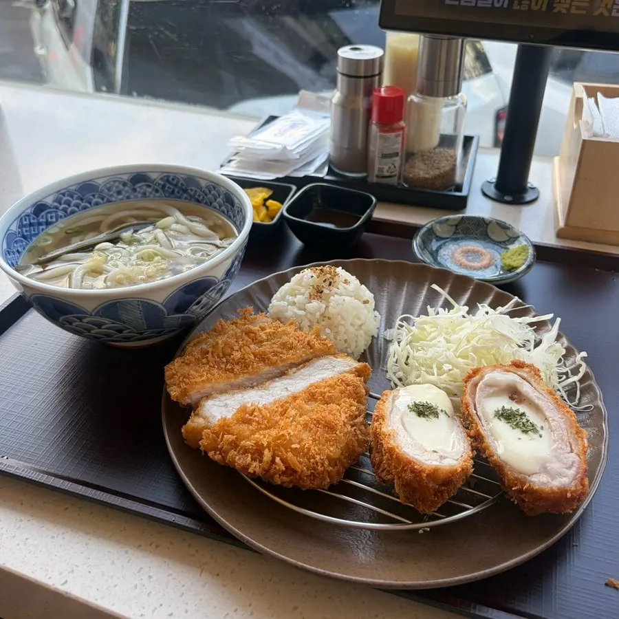 Full table spread of Kosi's half katsu set