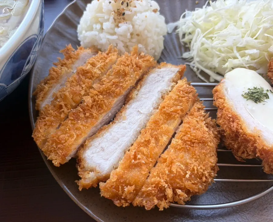 Hand-breaded tonkatsu and cheese katsu with salad and rice