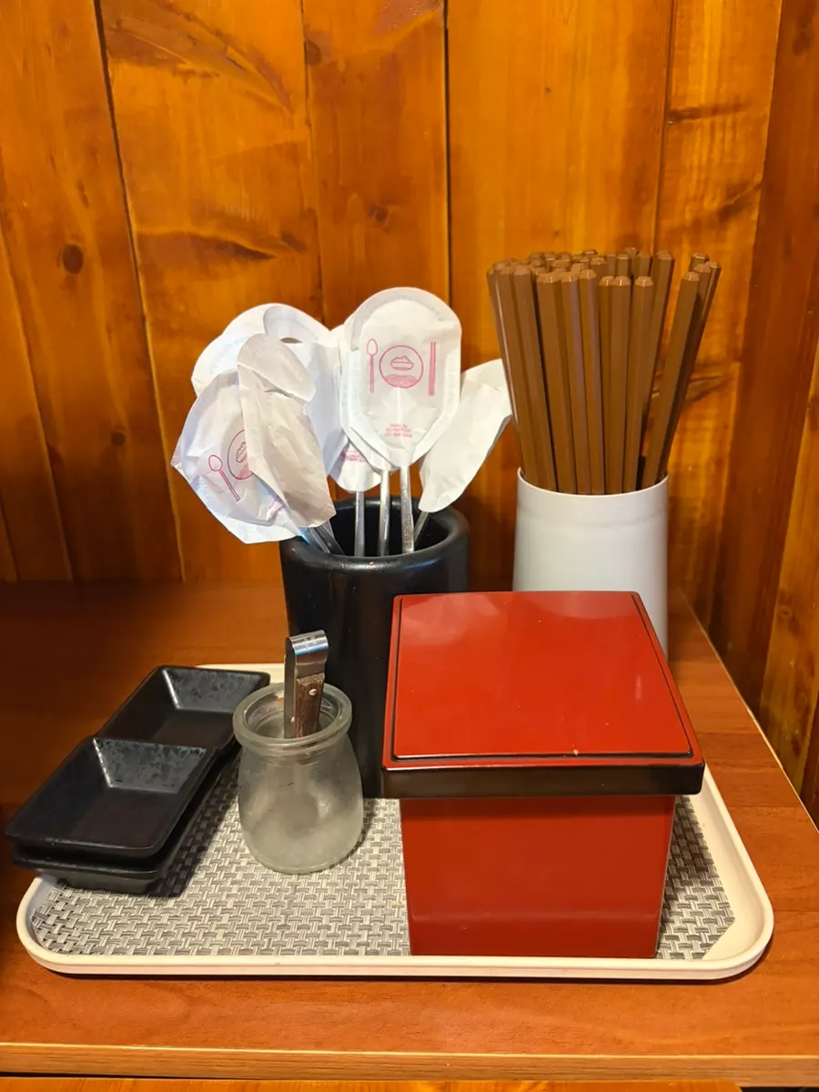 A table at Koutendon set with utensils
